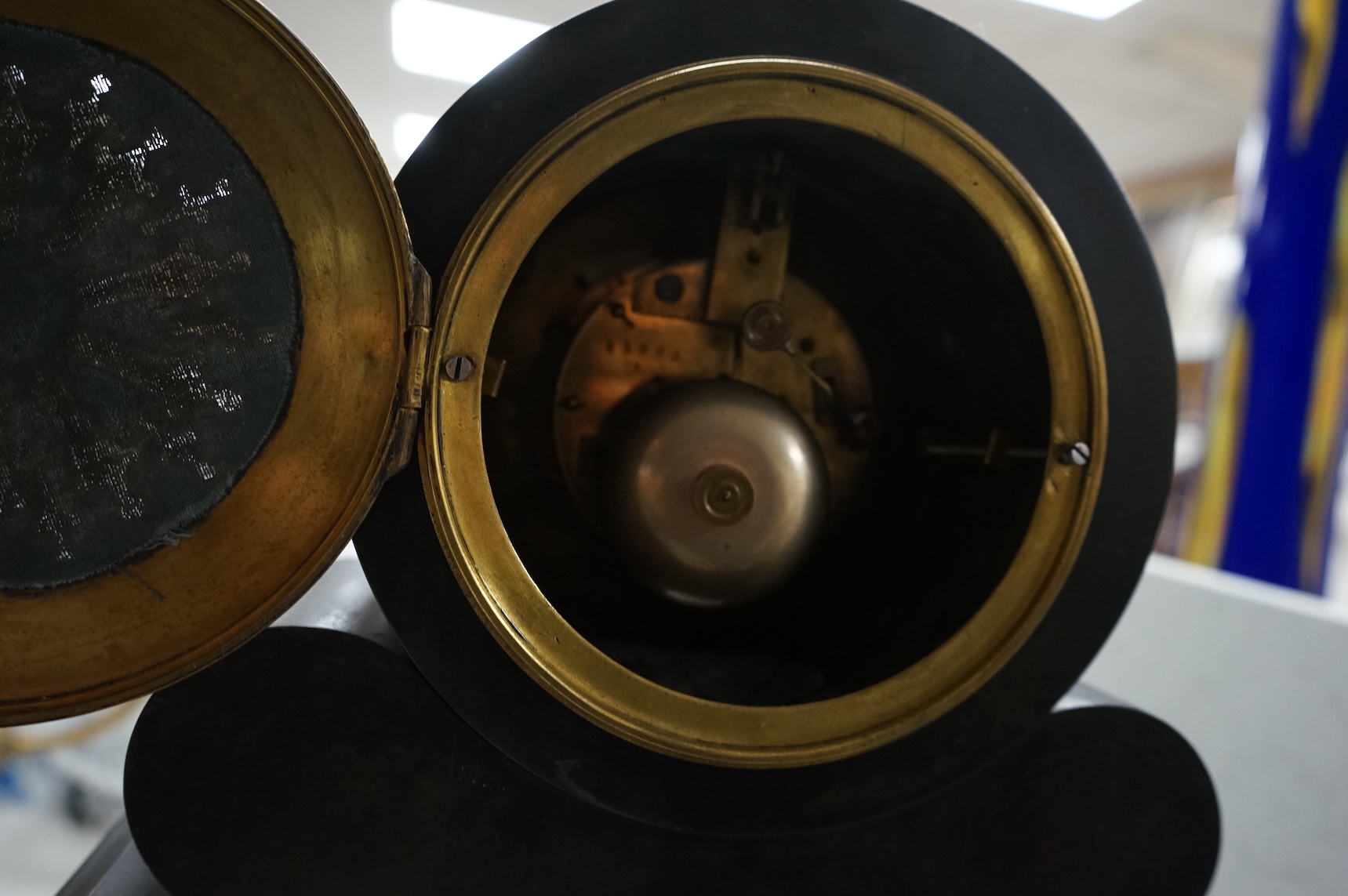 A Victorian slate clock garniture with enamelled chapter ring and mercury pendulum, 47cm high